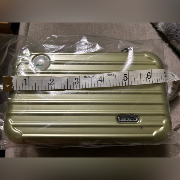 RIMOWA Handbags - RIMOWA Goldish Green Cosmetic Case